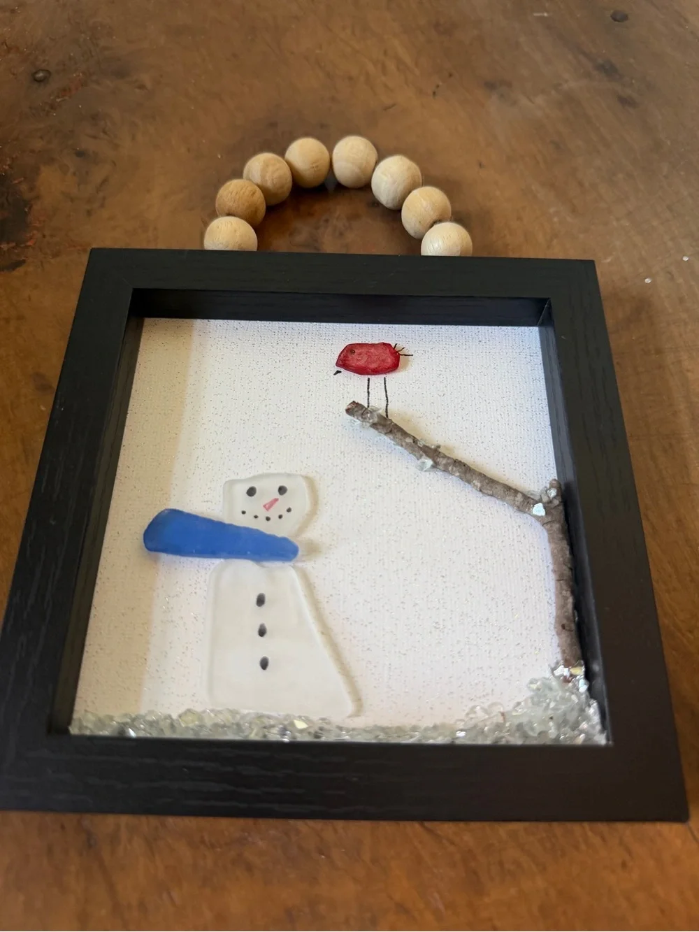 Handcrafted Black Framed Snowman Wall Art with Blue Scarf and Red Bird
